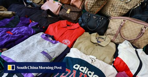 57 fake clothing|Hong Kong customs officers arrest businessman after seizing .